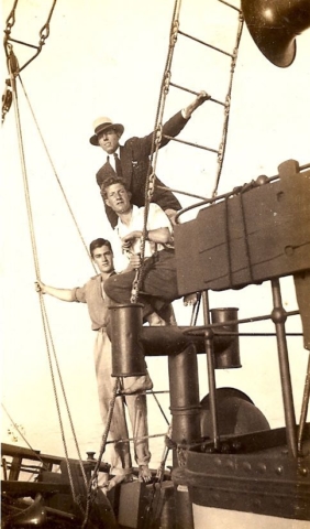 Norman at the top and Bert Fielder middle on the galley in Deal abs 1933