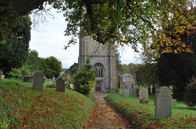 William and Jenny's grave is just to the left of the door