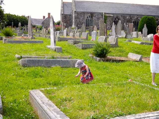 Isabella helping us to find Keverne gravestones